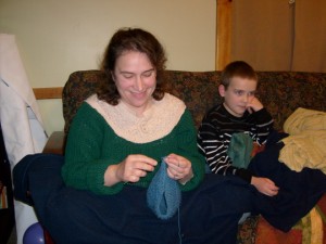 crocheting on the couch with M